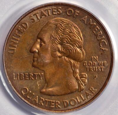 2003 quarter missing clad layer error showing exposed copper-colored core on one face